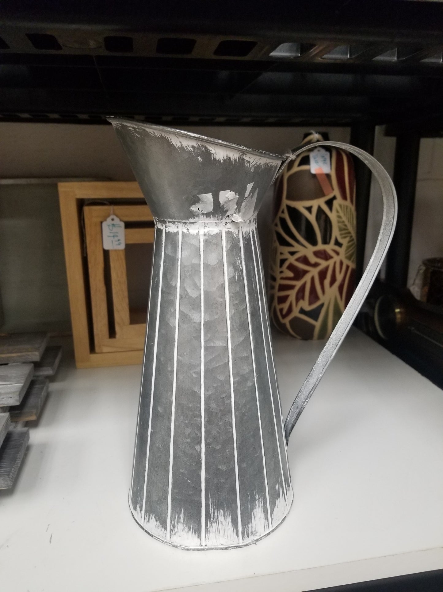 Tin pitcher