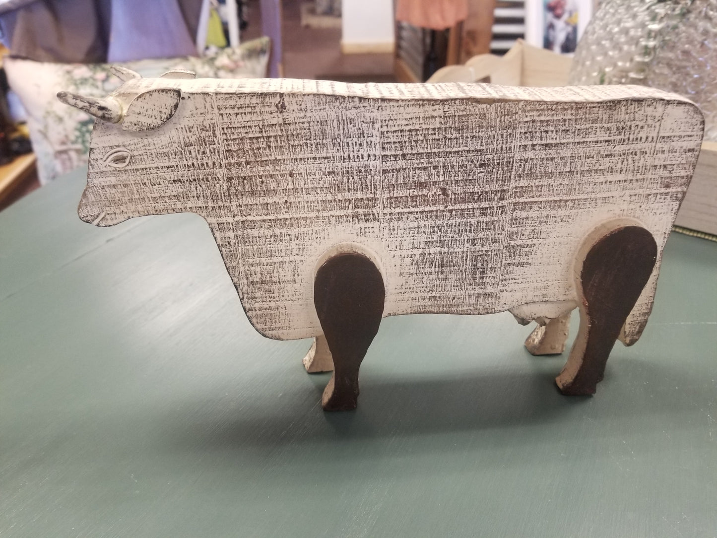 Carved wood cow