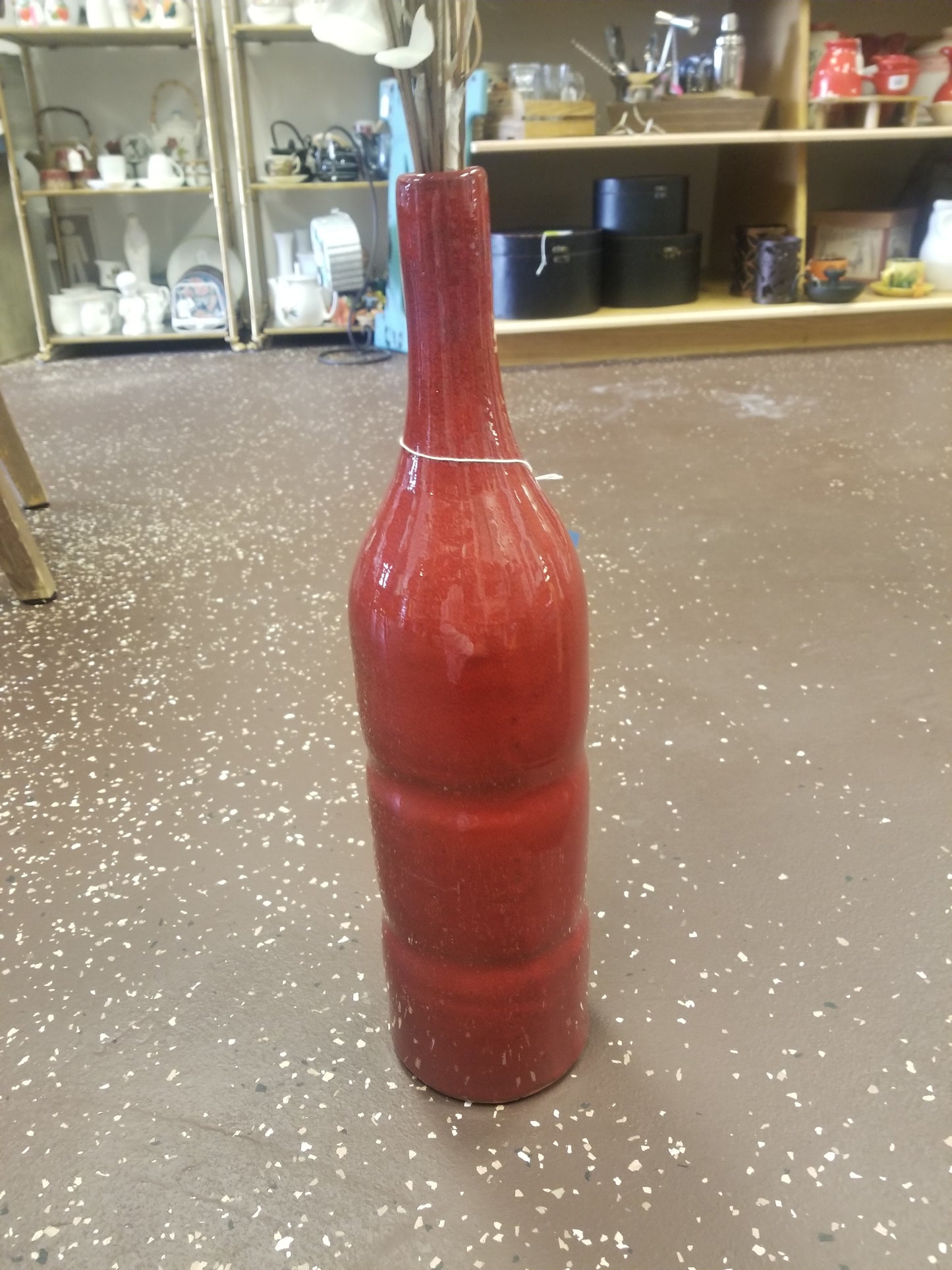 Tall red floor vase